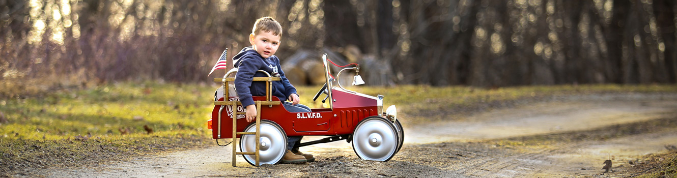 Boy in fire truck