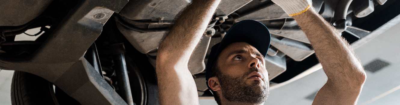 Mechanic fixing a car