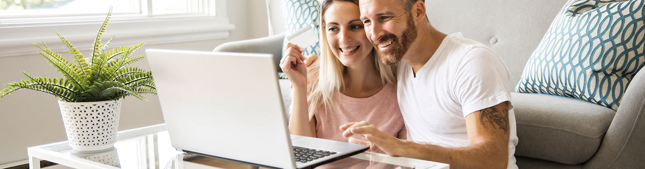 Couple excited about new online banking / mobile banking / bill pay