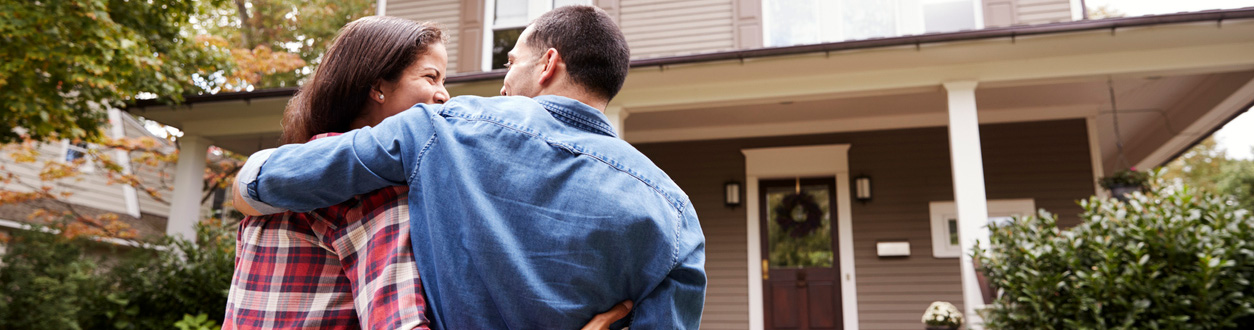 Couple looking at house